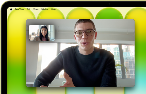 MacBook Neo na cor cítrico, uma videochamada no ecrã, a funcionalidade Enquadramento central mantém o utilizador centrado na imagem