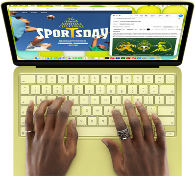 Mãos sobre o teclado do MacBook Neo na cor cítrico, utilizador a escrever um e-mail de convite para um evento desportivo, com o site do evento aberto ao lado