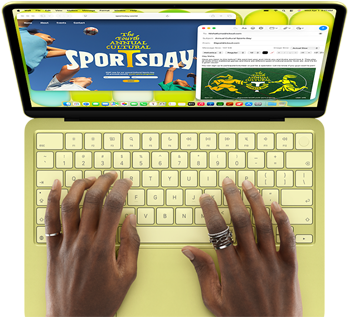 Mãos sobre o teclado do MacBook Neo na cor cítrico, utilizador a escrever um e-mail de convite para um evento desportivo, com o site do evento aberto ao lado