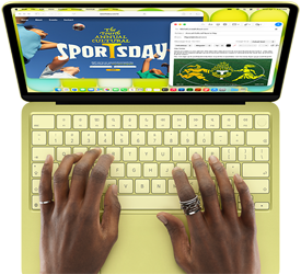 Mãos sobre o teclado do MacBook Neo na cor cítrico, utilizador a escrever um e-mail de convite para um evento desportivo, com o site do evento aberto ao lado