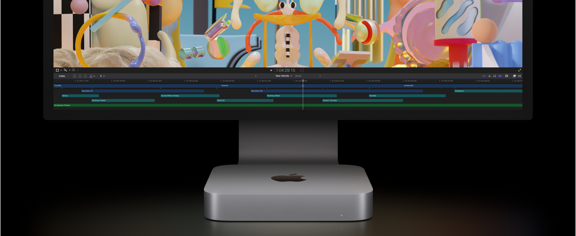 Vista frontal do Mac mini e Studio Display a mostrar um projeto de edição de vídeo no Final Cut Pro.